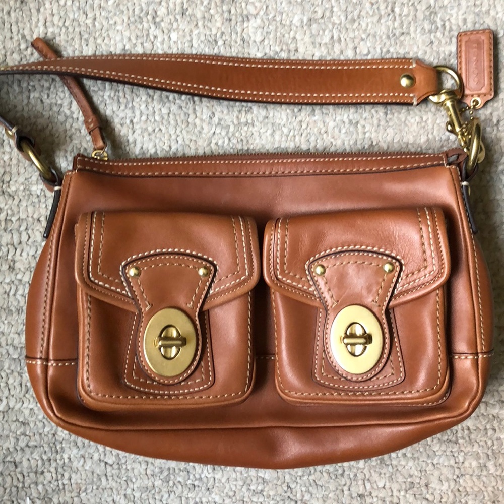 COACH women’s shoulder bag with front flat pockets